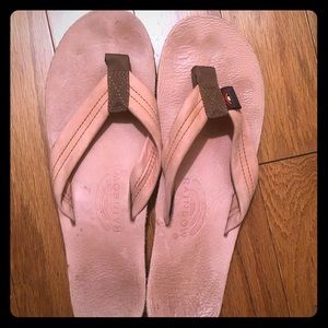 Pastel pink rainbow flip flops